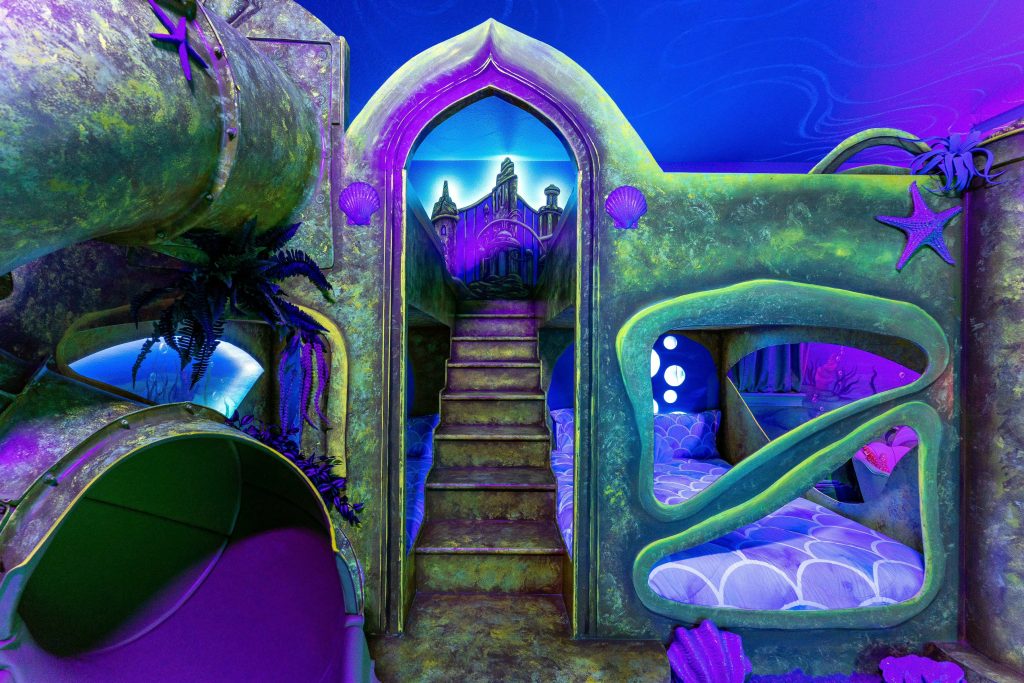 Little Mermaid themed bedroom with queen size double bunk bed with black light reactive paint and special effects