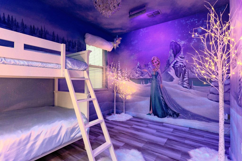Frozen Elsa Themed custom mural with black light reactive bank and LED trees