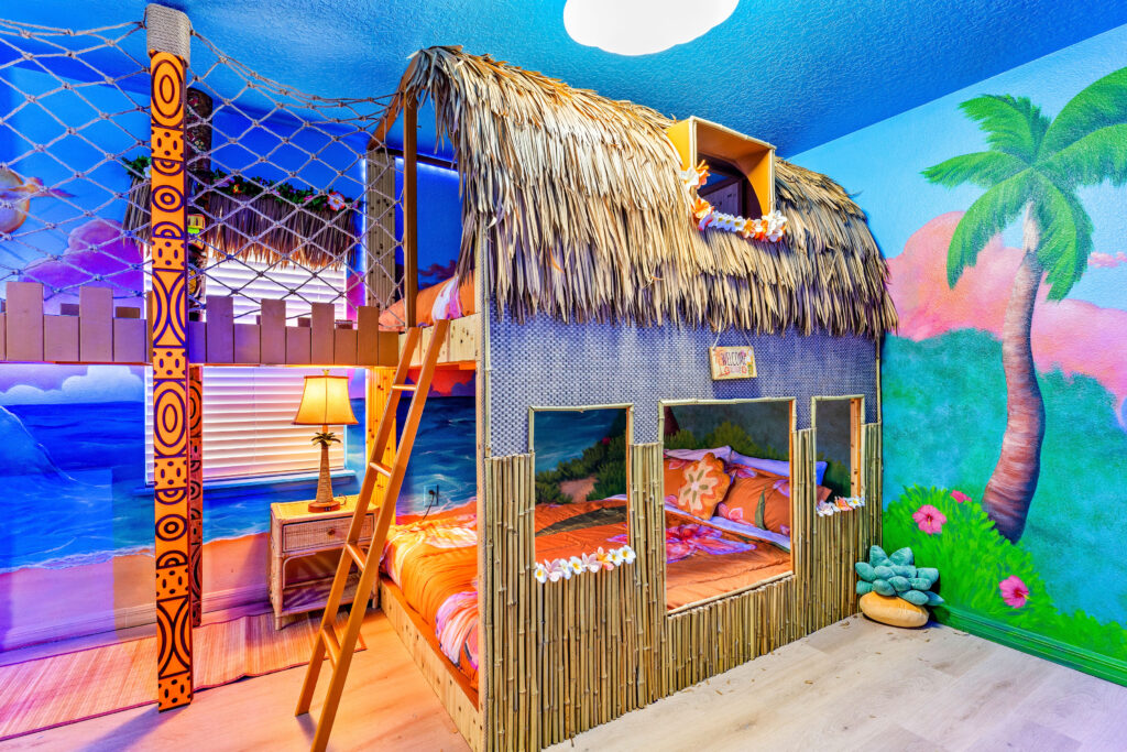 Moana Polynesian Themed Tiki Hut Queen bunk beds with black light reactive murals