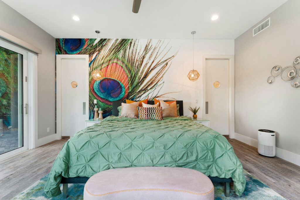 Peacock themed bedroom in modern tropical vacation home