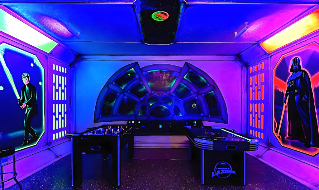 Star Wars Millenium Falcon Game Room black light reactive murals with glitter epoxy floor