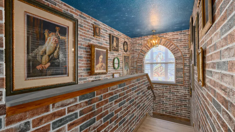 Hogwarts Castle Themed Stairwell in Orlando Vacation home designed by Magic Interiors
