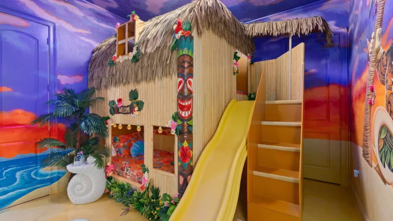 Support stairs with wall for access to top bunk and slide