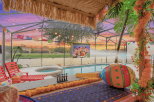 Custom designed screen enclosed private pool and spa with outdoor projector and games